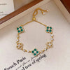 Mother-Of-Pearl Four-Leaf Clover Bracelet - Gold + Green Flowers